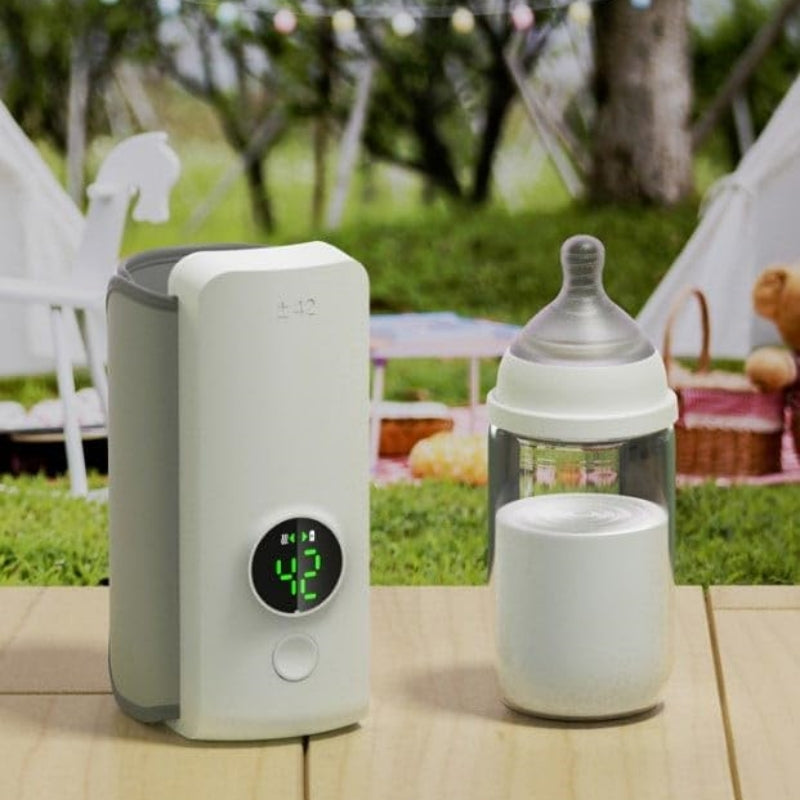 Portable wireless baby bottle warmer with USB charging and heating